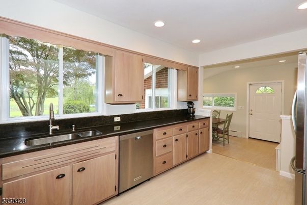Dining room, Interior, Kitchen, Recessed Lighting, Stainless Steel Appliances, Wood Texture Flooring