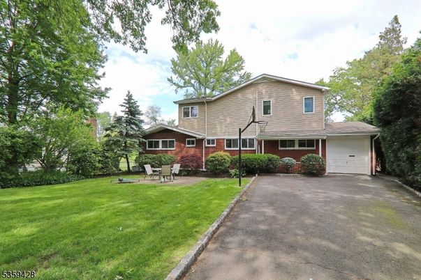 Attached, Backyard, Exterior, Facade, Brick Facade, Split Level