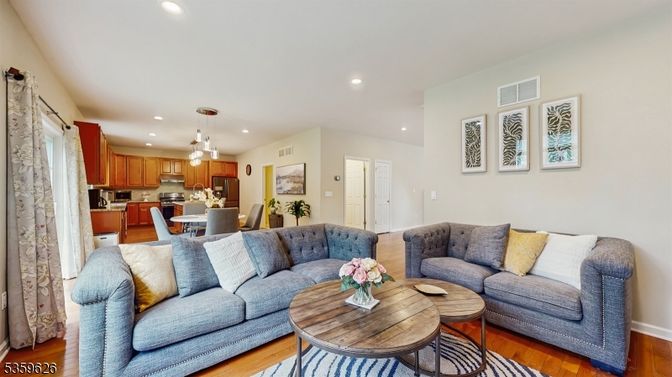 Dining room, Interior, Kitchen, Living room, Pendant Lights, Recessed Lighting, Stainless Steel Appliances, Wood Texture Flooring