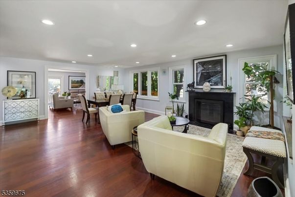 Dining room, Fireplace, Interior, Living room, Recessed Lighting, Wood Texture Flooring