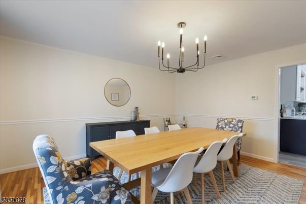 Chandelier, Dining room, Interior, Wood Texture Flooring