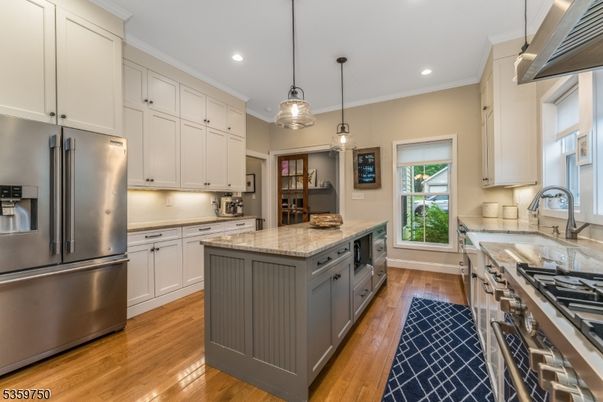 Interior, Kitchen, Pendant Lights, Recessed Lighting, Stainless Steel Appliances, Wood Texture Flooring