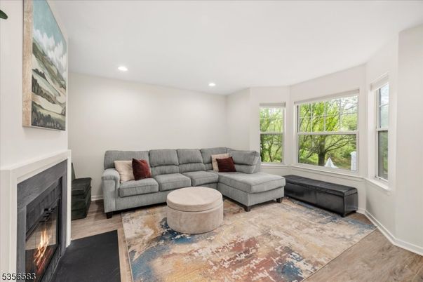 Fireplace, Interior, Living room, Recessed Lighting, Wood Texture Flooring
