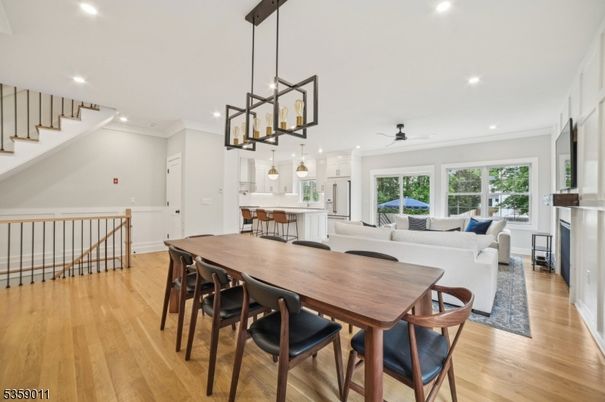 Dining room, Fireplace, Interior, Kitchen, Living room, Pendant Lights, Recessed Lighting, Wood Texture Flooring