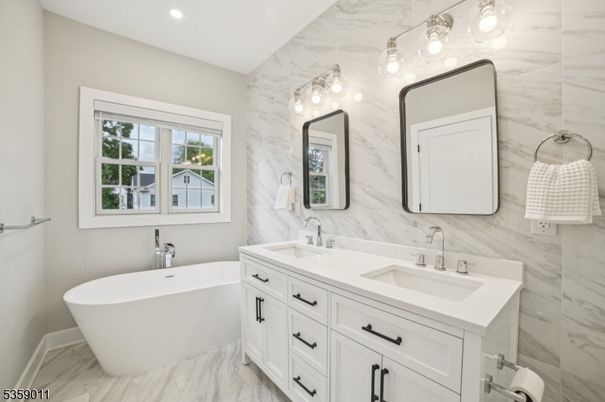 Bathroom, Dual Sink Vanities, Free Standing Baths, Interior, Marble, Marble Walls, Recessed Lighting