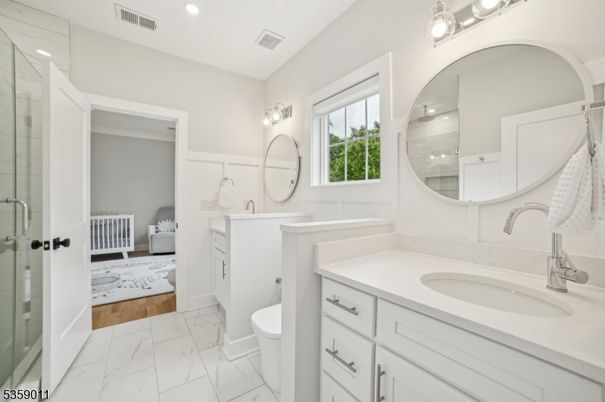 Bathroom, Bedroom, Dual Sink Vanities, Glass Shower, Interior, Marble, Recessed Lighting, Wood Texture Flooring