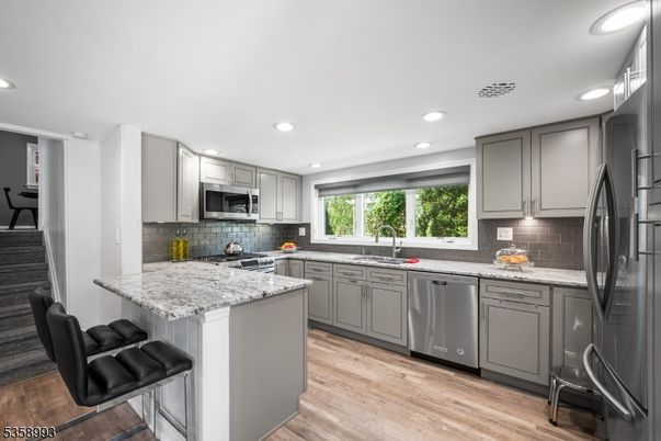 Interior, Kitchen, Recessed Lighting, Stainless Steel Appliances, Wood Texture Flooring