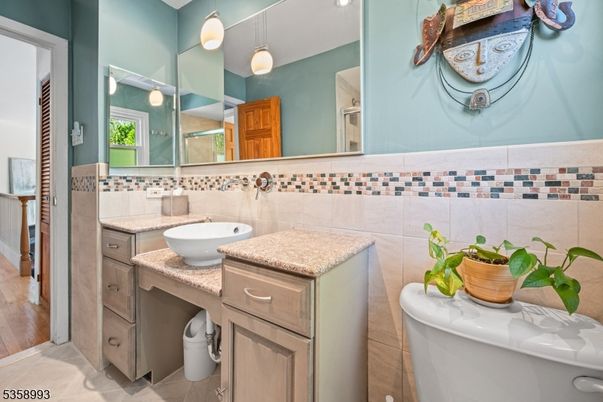 Bathroom, Dual Sink Vanities, Interior, Pendant Lights, Wood Texture Flooring