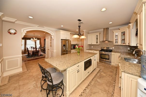 Chandelier, Dining room, Interior, Kitchen, Pendant Lights, Recessed Lighting, Stainless Steel Appliances
