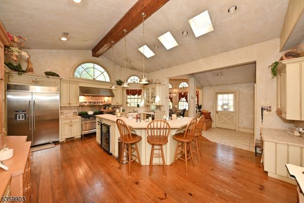 Interior, Kitchen, Pendant Lights, Recessed Lighting, Stainless Steel Appliances, Wooden Beams, Wood Texture Flooring