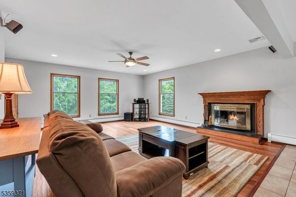 Fireplace, Interior, Living room, Recessed Lighting, Wood Texture Flooring