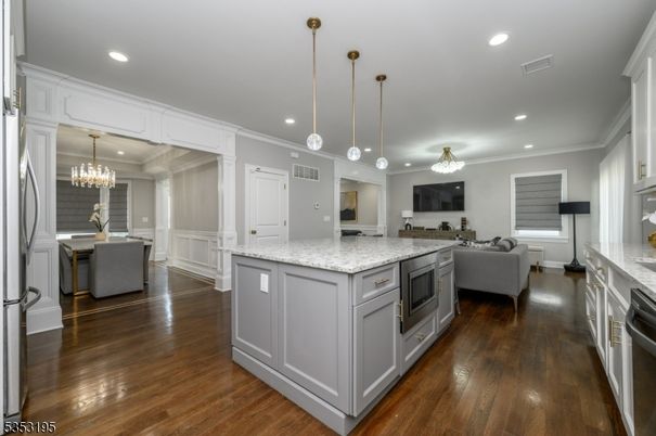 Chandelier, Dining room, Interior, Kitchen, Living room, Pendant Lights, Recessed Lighting, Wood Texture Flooring