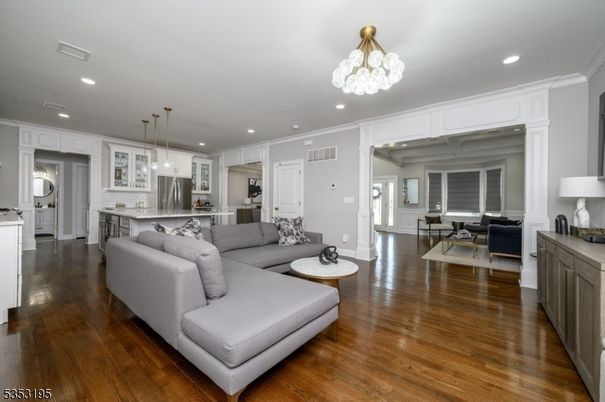 Dining room, Interior, Kitchen, Living room, Pendant Lights, Recessed Lighting, Stainless Steel Appliances, Wood Texture Flooring