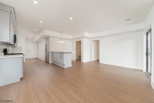 Empty room, Interior, Kitchen, Pendant Lights, Recessed Lighting, Wood Texture Flooring