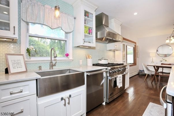 Dining room, Interior, Kitchen, Recessed Lighting, Stainless Steel Appliances, Wood Texture Flooring