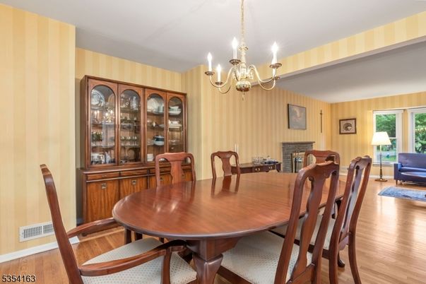 Chandelier, Dining room, Fireplace, Interior, Wood Texture Flooring