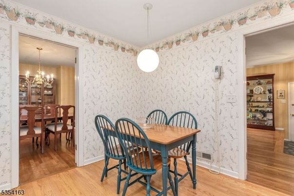 Chandelier, Dining room, Interior, Pendant Lights, Wood Texture Flooring