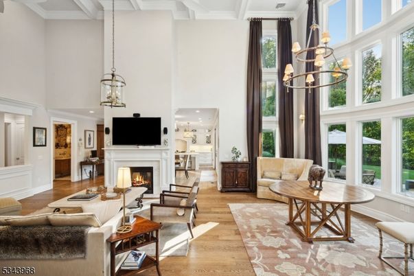 Chandelier, Fireplace, Interior, Living room, Pendant Lights, Recessed Lighting, Wood Texture Flooring