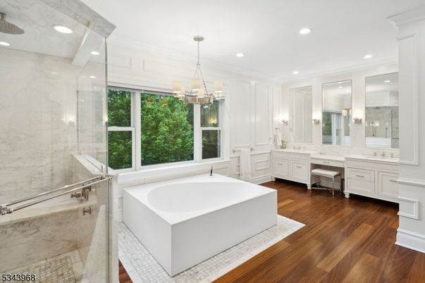 Bathroom, Dual Sink Vanities, Glass Shower, Interior, Pendant Lights, Recessed Lighting, Wood Texture Flooring