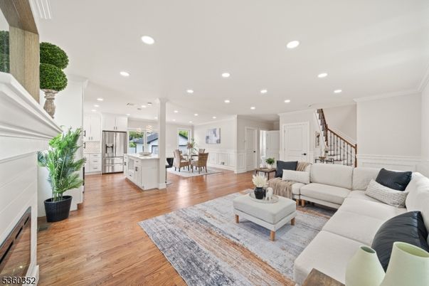 Dining room, Interior, Kitchen, Living room, Recessed Lighting, Stainless Steel Appliances, Wood Texture Flooring