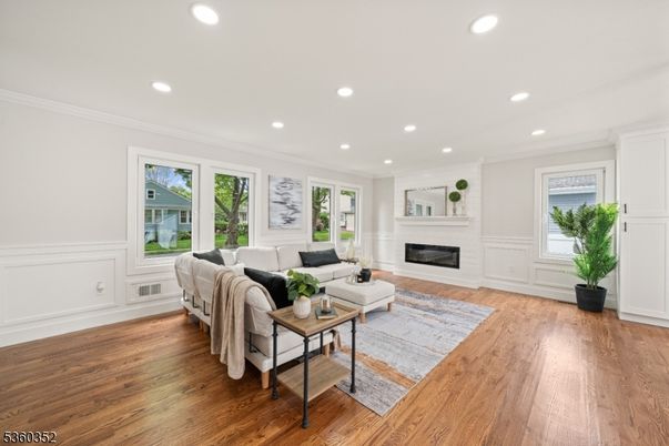 Fireplace, Interior, Living room, Recessed Lighting, Wood Texture Flooring