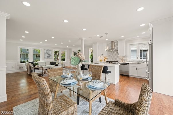 Dining room, Interior, Kitchen, Living room, Pendant Lights, Recessed Lighting, Stainless Steel Appliances, Wood Texture Flooring