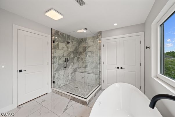 Bathroom, Free Standing Baths, Glass Shower, Interior, Marble, Marble Walls, Recessed Lighting