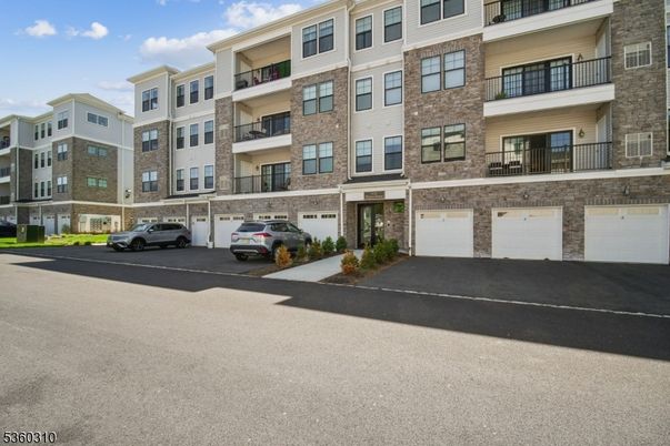 Attached, Exterior, Facade, Brick Facade, Condo Building