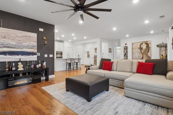 Fireplace, Interior, Kitchen, Living room, Recessed Lighting, Wood Texture Flooring