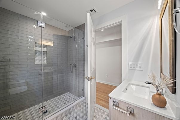 Bathroom, Glass Shower, Interior, Recessed Lighting, Wood Texture Flooring