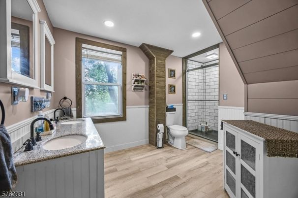 Bathroom, Dual Sink Vanities, Interior, Recessed Lighting, Wood Texture Flooring