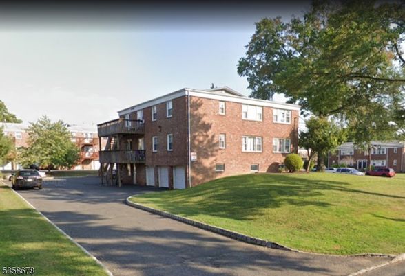 Backyard, Exterior, Facade, Brick Facade, Condo Building