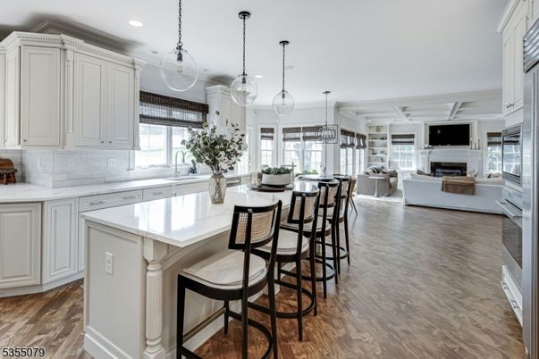 Fireplace, Interior, Kitchen, Living room, Pendant Lights, Recessed Lighting, Wood Texture Flooring