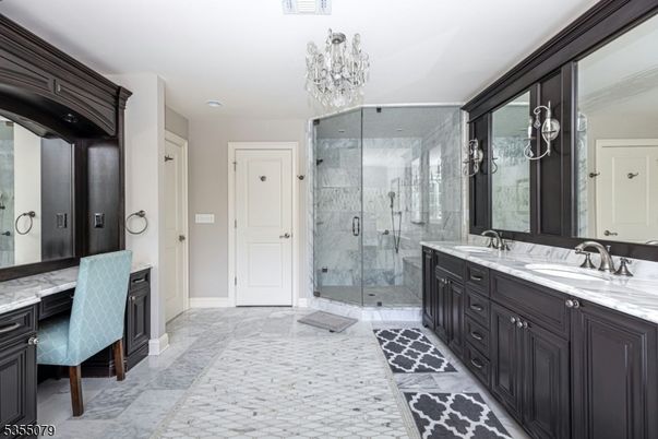 Bathroom, Chandelier, Dual Sink Vanities, Glass Shower, Interior, Marble Walls, Recessed Lighting
