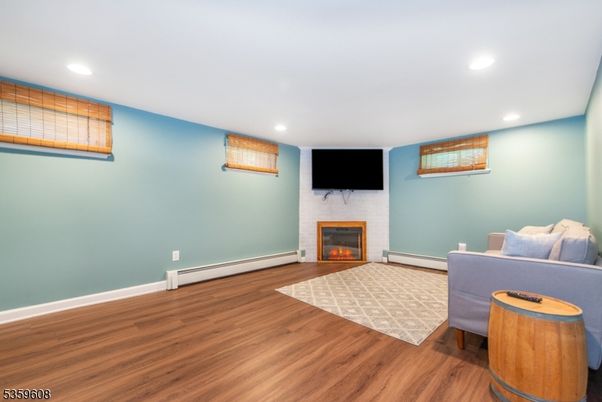 Fireplace, Interior, Recessed Lighting, Wood Texture Flooring