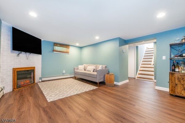 Fireplace, Interior, Recessed Lighting, Wood Texture Flooring