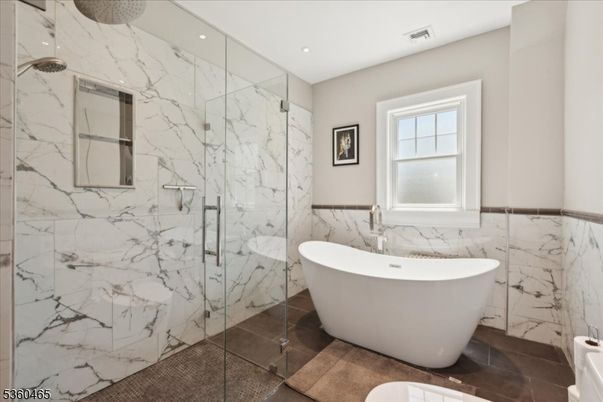 Bathroom, Free Standing Baths, Glass Shower, Interior, Marble Walls, Recessed Lighting