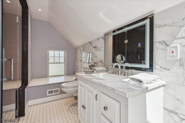 Bathroom, Dual Sink Vanities, Interior, Marble Walls, Recessed Lighting