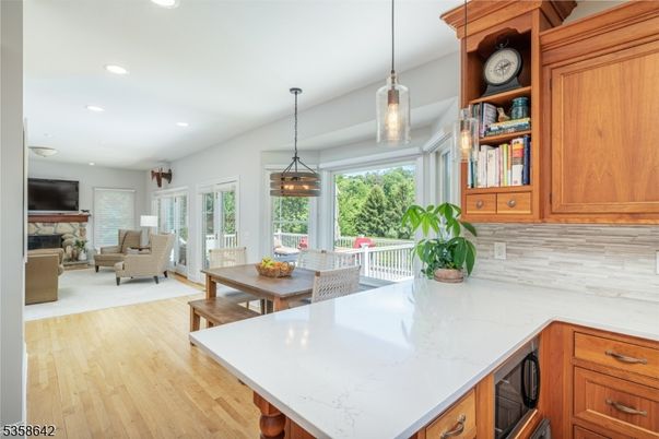 Dining room, Fireplace, Interior, Kitchen, Living room, Pendant Lights, Recessed Lighting, Wood Texture Flooring
