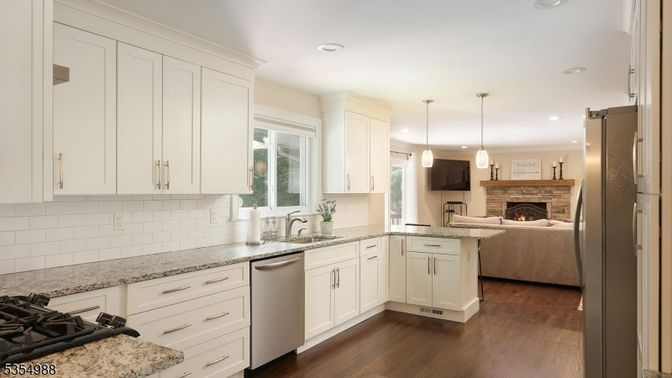 Fireplace, Interior, Kitchen, Pendant Lights, Recessed Lighting, Stainless Steel Appliances, Wood Texture Flooring