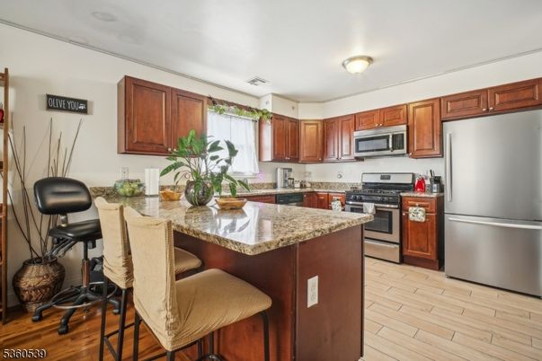 Interior, Kitchen, Stainless Steel Appliances, Wood Texture Flooring