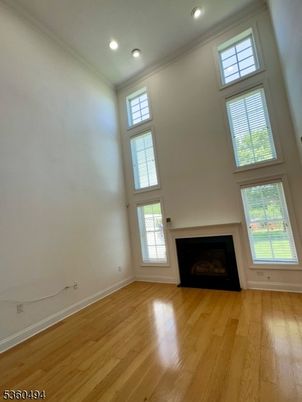 Empty room, Fireplace, Interior, Recessed Lighting, Wood Texture Flooring