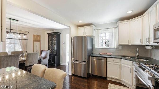 Dining room, Interior, Kitchen, Pendant Lights, Recessed Lighting, Stainless Steel Appliances, Wood Texture Flooring
