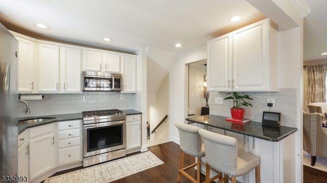 Dining room, Interior, Kitchen, Recessed Lighting, Stainless Steel Appliances, Wood Texture Flooring