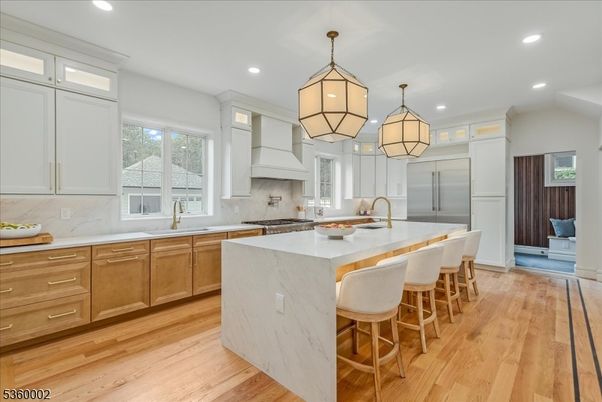 Interior, Kitchen, Marble Walls, Pendant Lights, Recessed Lighting, Wood Texture Flooring