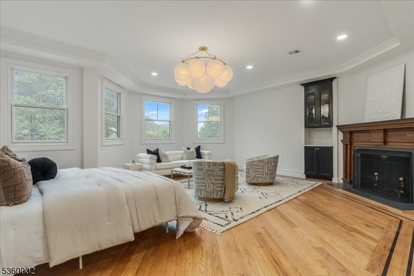 Bedroom, Fireplace, Interior, Recessed Lighting, Wood Texture Flooring