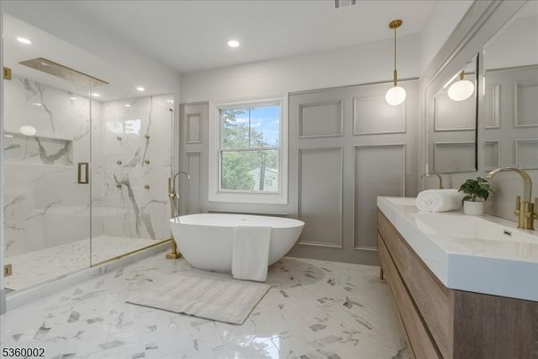 Bathroom, Dual Sink Vanities, Free Standing Baths, Glass Shower, Interior, Marble, Marble Walls, Pendant Lights, Recessed Lighting