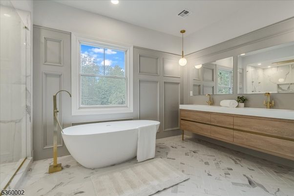 Bathroom, Free Standing Baths, Interior, Marble, Marble Walls, Pendant Lights, Recessed Lighting