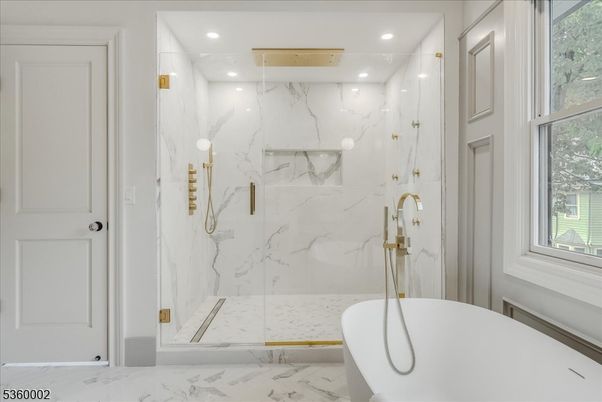 Bathroom, Free Standing Baths, Glass Shower, Interior, Marble, Marble Walls, Recessed Lighting