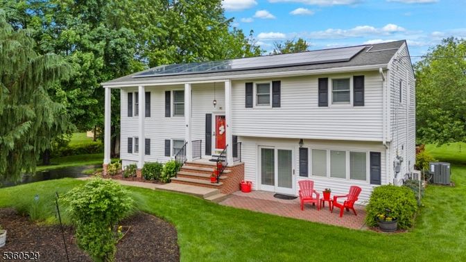 Backyard, Exterior, Facade, Solar Panels, Raised Ranch